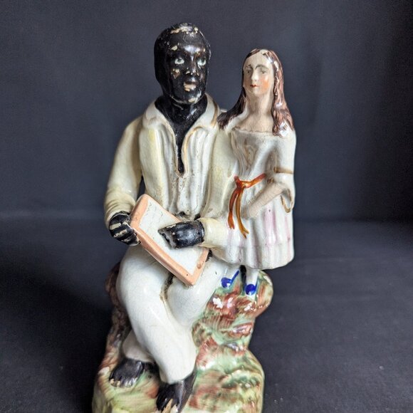 Staffordshire Arbor Figure Of Uncle Tom And Eva Seated Porcelain Figurine